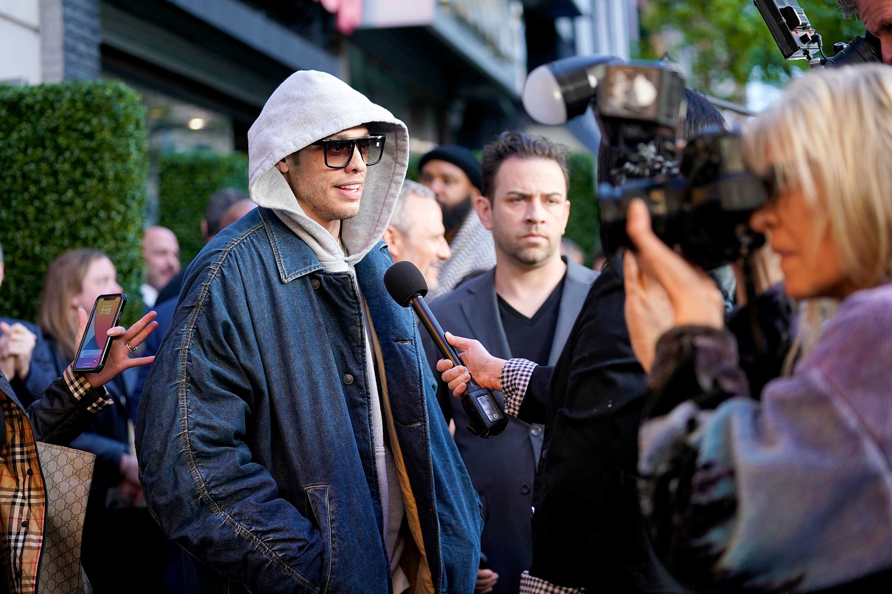 Pete Davidson with photographers at the Bupkis premiere.