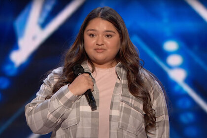 Kristen Cruz singing on the AGT stage