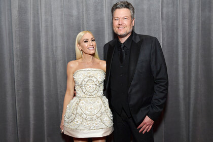 Blake Shelton and Gwen Stefani standing together