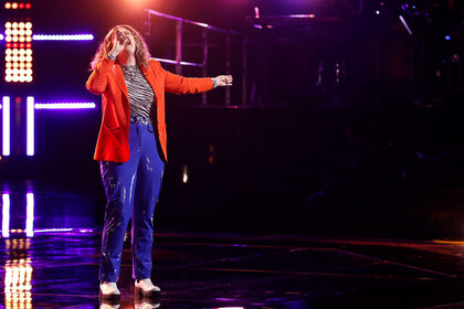 Kate Kalvach performing on the voice stage