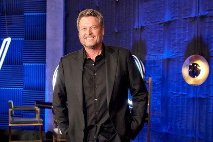 The Voice's Blake Shelton smiling at the camera