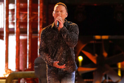 Kane Brown performs on stage during The Voice finale