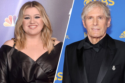 Kelly Clarkson and Michael Bolton perform together