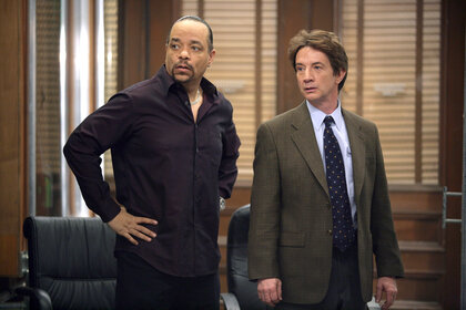 Detective Odafin Tutuola (Ice-T) and Sebastian Ballentine (Martin Short) stand together on Law & Order: Special Victim's Unit Episode 618.