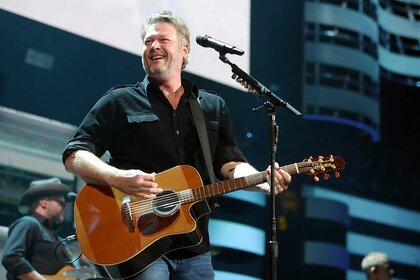 Blake Shelton performing on stage.