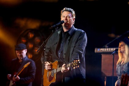 Blake Shelton performing on stage.