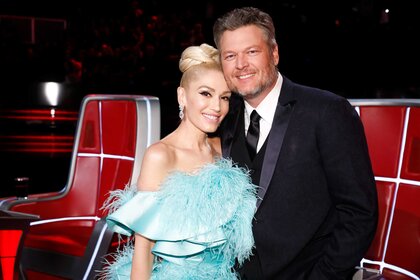 Gwen Stefani and Blake Shelton posing together during The Voice.