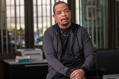 Sgt. Fin Tutuola in an office.