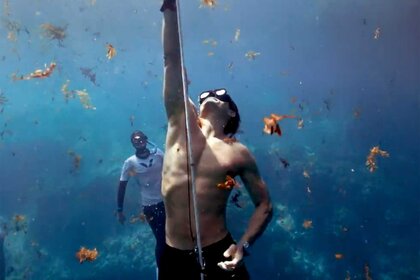 Orlando Bloom in the ocean.