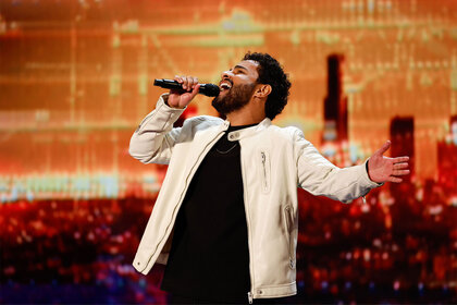 Gabriel Henrique performs on the Americas Got Talent stage