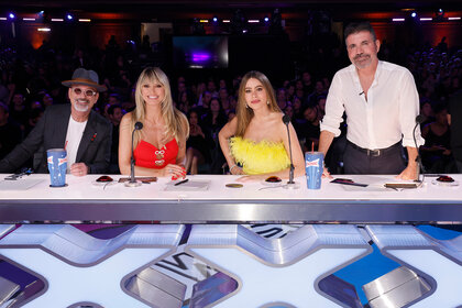 (l-r) Howie Mandel, Heidi Klum, Sofia Vergara and Simon Cowell on stage during Americas Got Talent