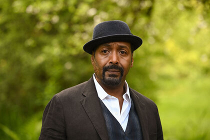 Alec Mercer (Jesse L. Martin) looks pensive