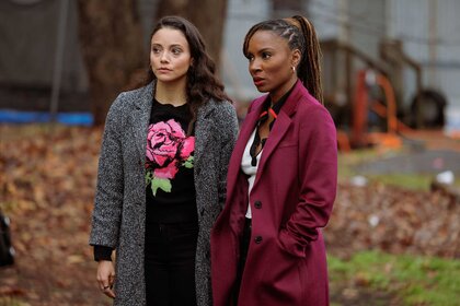 Lacey Quinn and Gabi Mosely having a conversation with another character outside.