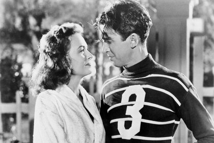 Donna Reed & James Stewart stare at each other