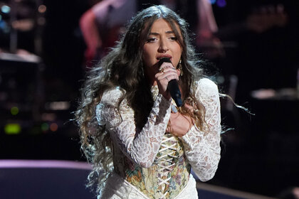 Nini Iris performs on The Voice stage