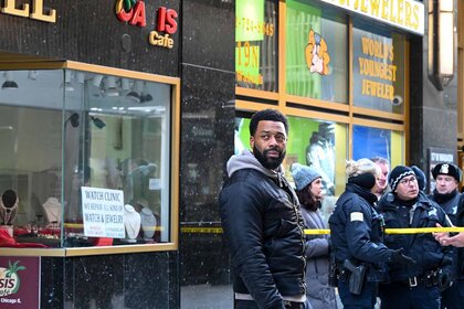 Kevin Atwater (LaRoyce Hawkins) stands near a police investigation in Chicago P.D. Season 11 Episode 5 "Split Second".