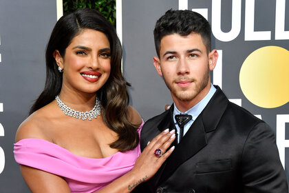 Priyanka Chopra and Nick Jonas pose for a photo at the 77th Annual Golden Globe Awards