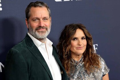 Peter Hermann and Mariska Hargitay pose together.