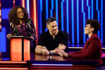 Joe Manganiello and a contestant during game play on Password