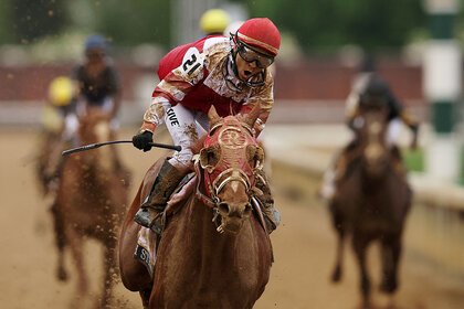 Jockey Sonny Leon rides Rich Strike as they win the 148th running of the Kentucky Derby