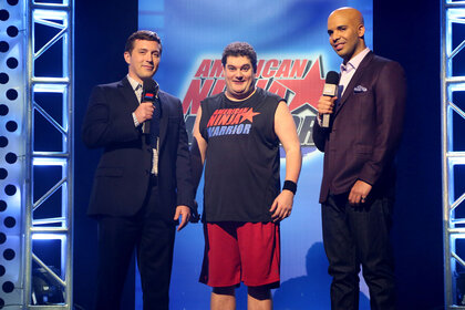 Beck Bennett as Matt Iseman, Bobby Moynihan as Jeff Metcalf, and Drake as Akbar Gbajabiamila during the "American Ninja Warrior" sketch