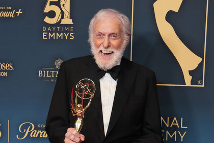 Dick Van Dyke poses with his Emmy award at the 51st annual Daytime Emmys Awards