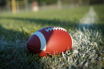 Football sitting on a field