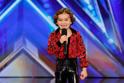 Boss Baby Brody speaks onstage during Americas Got Talent Season 19 Episode 5.