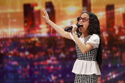 Mia Soleil Sanchez performs onstage on America's Got Talent Episode 1907.