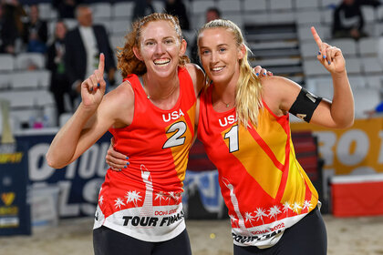 Sara Hughes (R) and Kelly Cheng (L) of United States celebrate after winning the final of women's Volleyball World Beach Pro Tour Finals