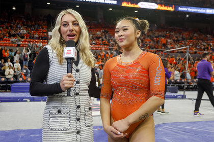 Samantha Peszek interviews Suni Lee at a gymnastics meet in 2023