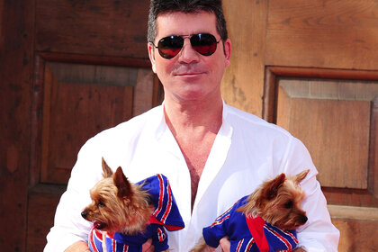 Simon Cowell and his dogs Squiddly and Diddly attend a press launch for Britain's Got Talent