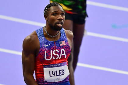 US' Noah Lyles reacts after competing in the men's 200m final at the Paris 2024 Olympics