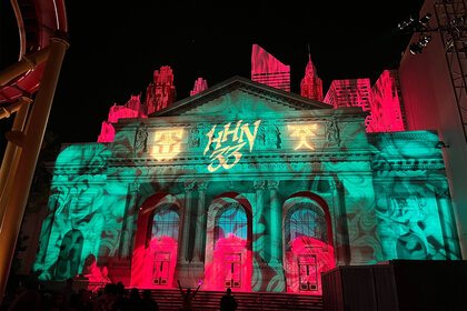 A view of the light show on a building at Halloween Horror Nights at Universal Orlando