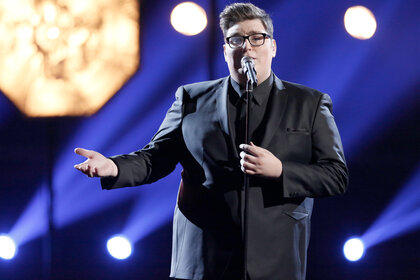 Jordan Smith performs on stage on the voice Episode 918A