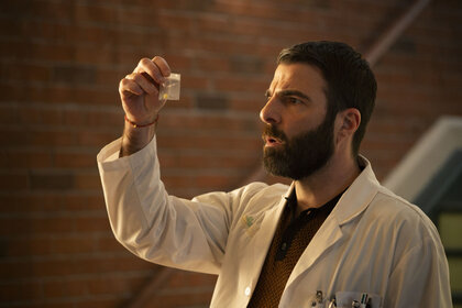 Dr. Oliver Wolf (Zachary Quinto) holding a bagged substance in Brilliant Minds Season 1, Episode 4.