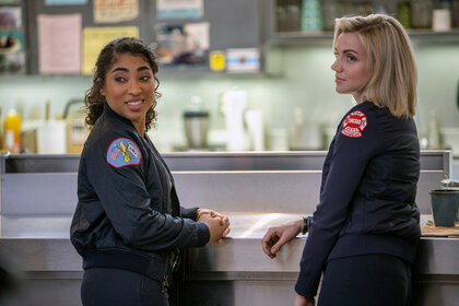 Gianna Mackey (Adriyan Rae) and Sylvie Brett (Kara Killmer) talking together on Chicago Fire Season 9 Episode 9.