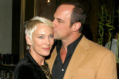 Christopher Meloni kisses his wife Sherman Williams's head