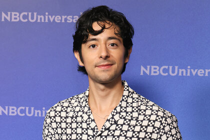 Pablo Castelblanco wears a black and white shirt on the red carpet