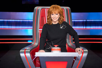 Reba McEntire sits in her coaches chair on The Voice Season 26 Episode 9