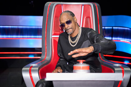 Snoop Dogg presses the button on his chair on The Voice Season 26 Episode 10