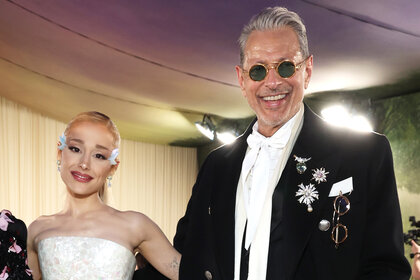 Ariana Grande and Jeff Goldblum pose together on the red carpet at the met gala