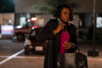 Dr. Carol Pierce (Tamberla Perry) talking on the phone in Brilliant Minds Season 1, Episode 9.