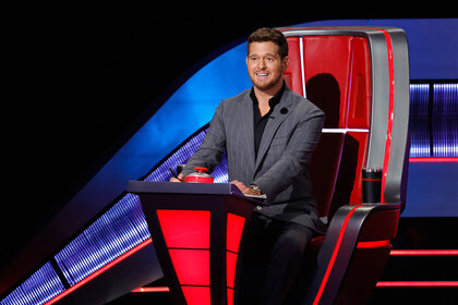 Michael Bublé sits on his coaches chair on The Voice Season 26 Episode 12