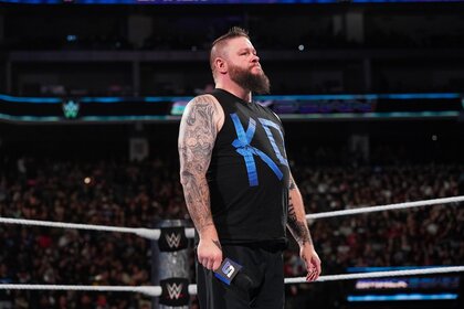 Kevin Owens stands in the ring during WWE SmackDown