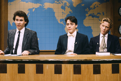 Dennis Miller, Robert Downey Jr. and Anthony Michael Hall during the weekend update on Saturday Night Live