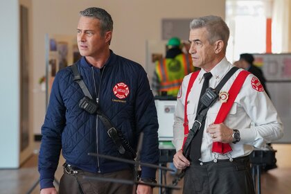 Kelly Severide (Taylor Kinney) and Chief Dom Pascal (Dermot Mulroney) stand in a hospital on Chicago P.D. Episode 1214.