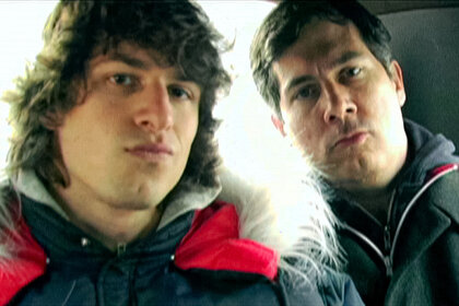 Andy Samberg and Chris Parnell sit in a cab together during a sketch on Saturday Night Live Season 31