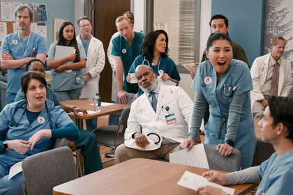 Alex, Dr. Ron and Serena sit in break room on St. Denis Medical Season 1, Episode 7.