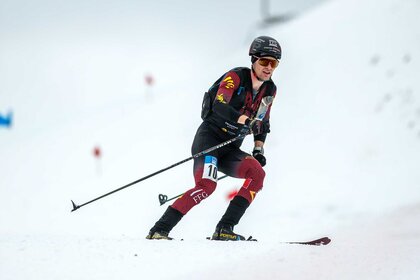 Maximilien Drion skiiing on top of snow during the ISMF Ski Mountaineering World Cup.